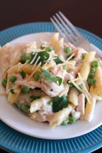 One Skillet Chicken Alfredo with Peas on a white plate