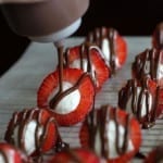 Cream Filled Chocolate Strawberries being drizzled with chocolate