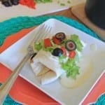 Take your fiesta to another level by smothering these beef and bean burritos in a sour cream and green chili sauce.