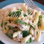 One Skillet Chicken Alfredo with Peas on a white plate