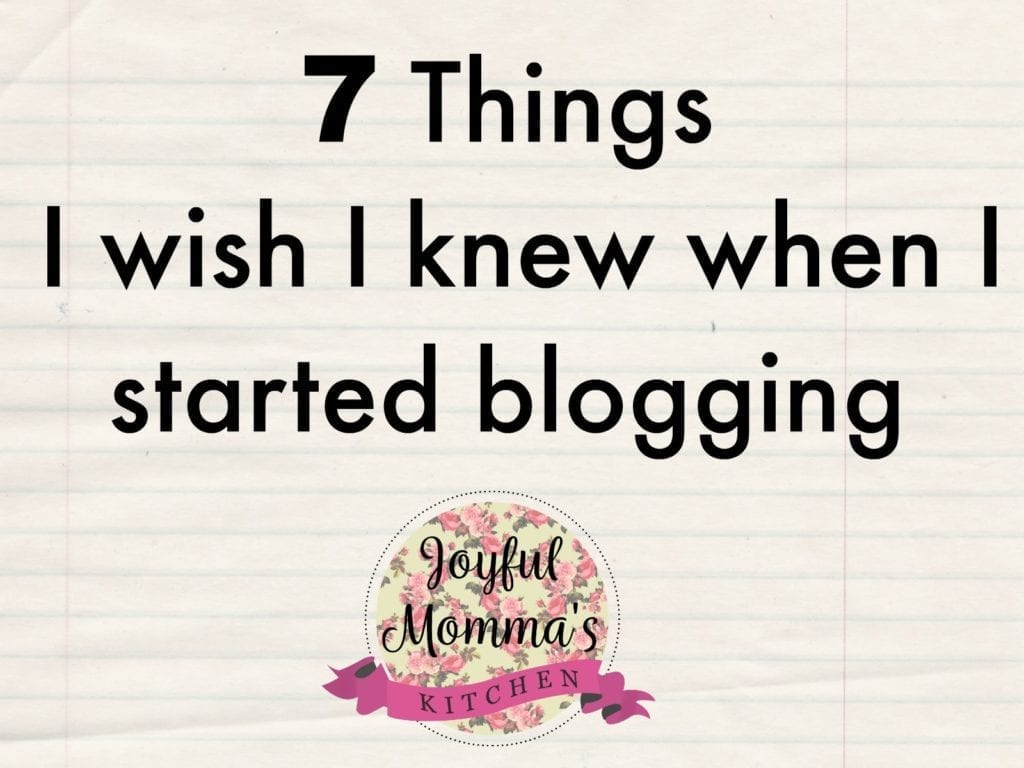 Text saying "7 Things I wish I knew when I started blogging" with lined paper background and Joyful Mommas kitchen logo at the bottom.