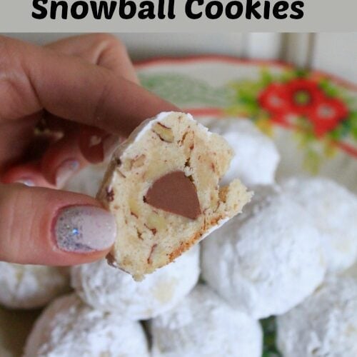 Surprise Snowball Cookies text overlay with an image of white ball cookies cut open showing a chocolate kiss inside