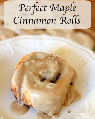 Perfect Maple Cinnamon Rolls text overlay with cinnamon roll sitting on a white plate