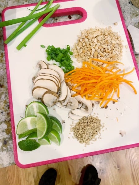 Spicy Thai Vegetable Ramen Ingredients prepared on a cutting board ready to assemble