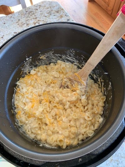 Instant Pot Mac and Cheese being missed together inside the pressure cooker