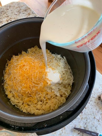 Heavy cream being added to Instant Pot Mac and Cheese