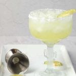 margarita ingredients on a white plate set on a white countertop