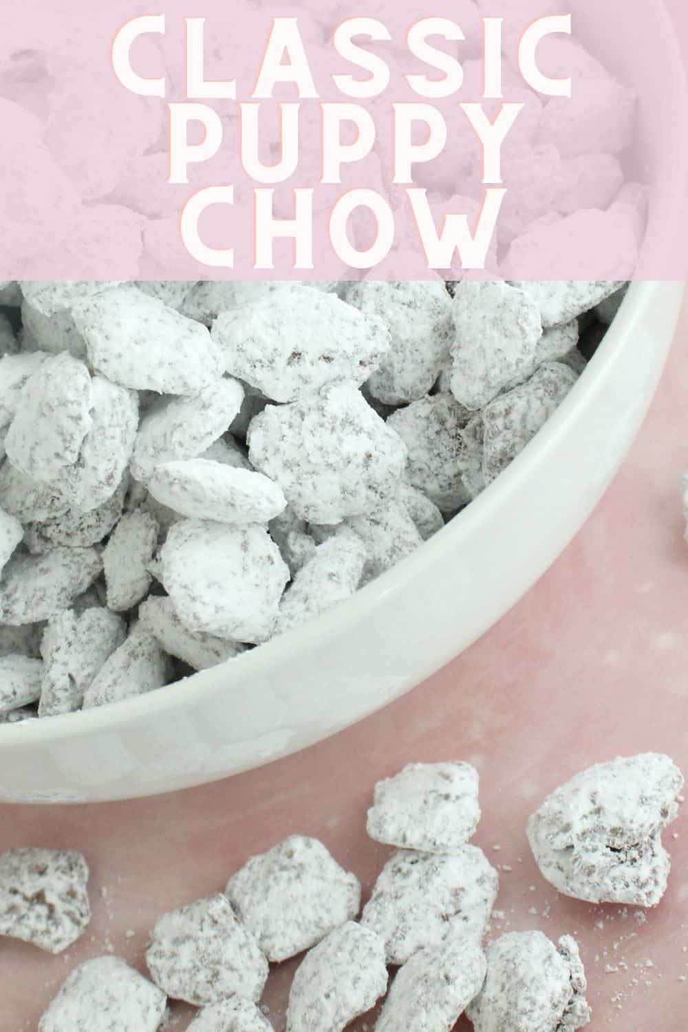 chocolate snack mix in a white bowl with pink background