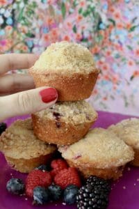 Stack of muffins on a purple background