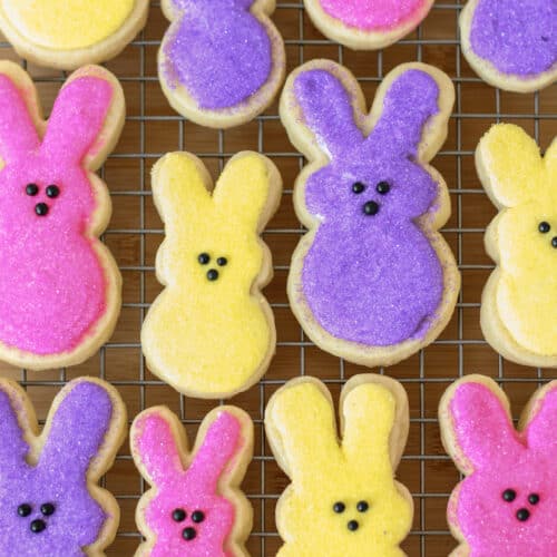 brightly colored bunny cookies with bright frosting and sprinkles