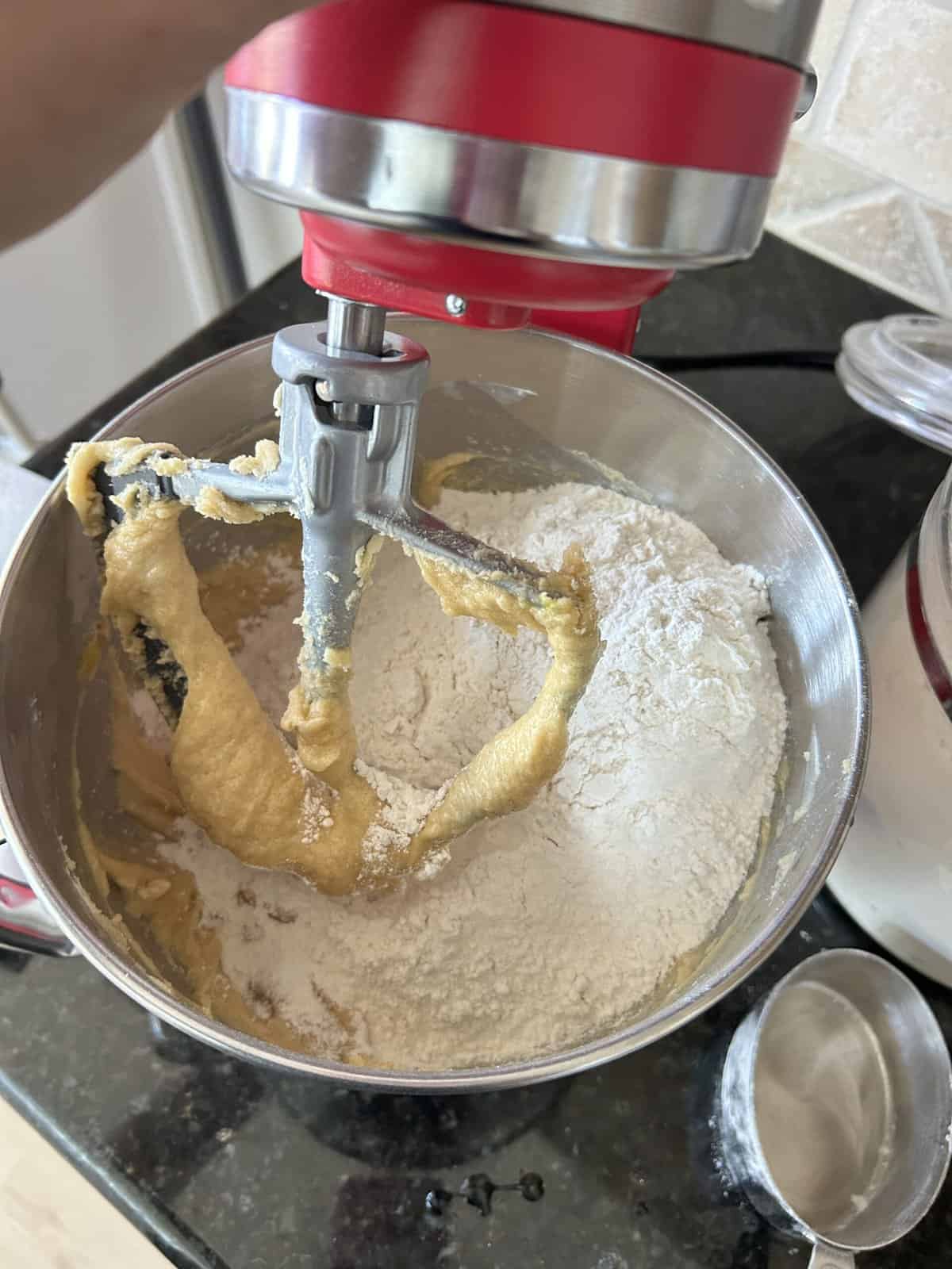 Butter mixture and flour in a mixing bowl