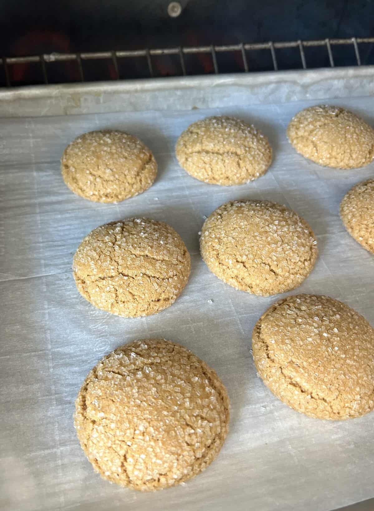 Cookies in the oven starting to crack on top